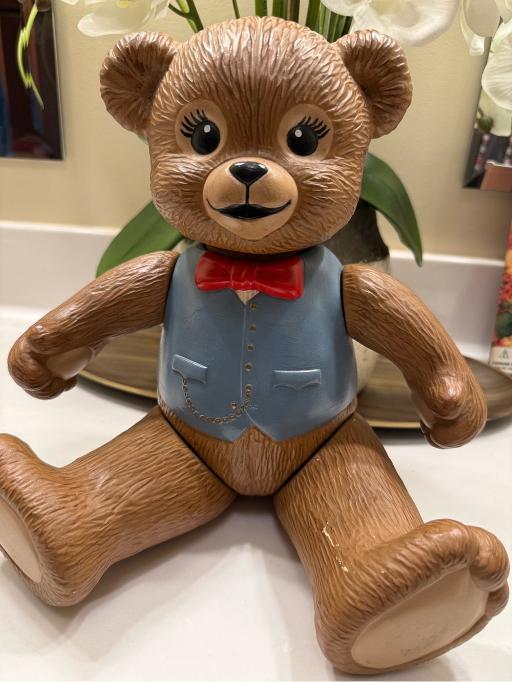 Vintage ceramic jointed Brown Teddy Bear Figurine with Blue Vest & Red Bow